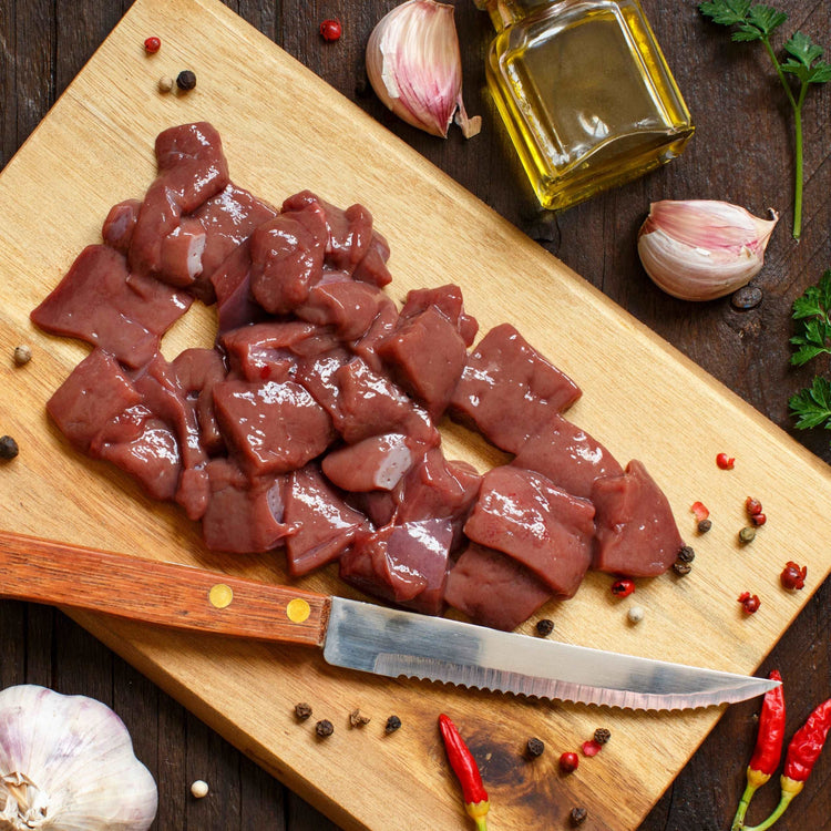 Raw beef liver with spices, herbs and vegetables