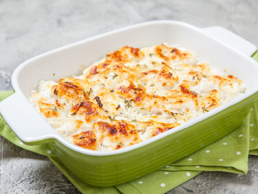 Baked Alaskan Halibut With Creamy Roasted Garlic Sauce