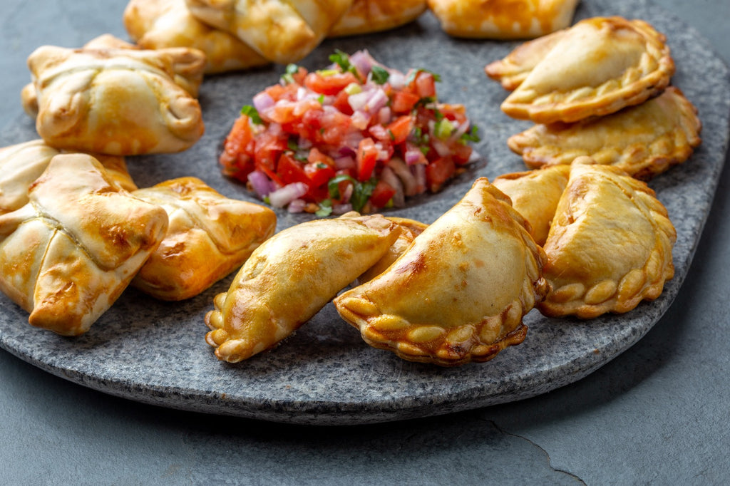 Traditional Bolivian Street Food: Salteñas (Meat Empanadas)