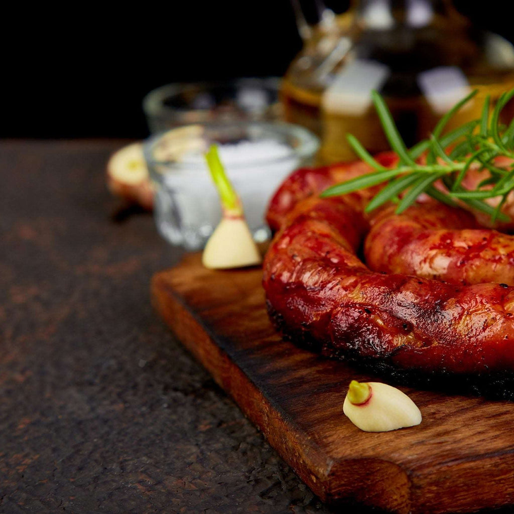 Grilled or Roasted spiral pork sausages with rosemary, salt and peper