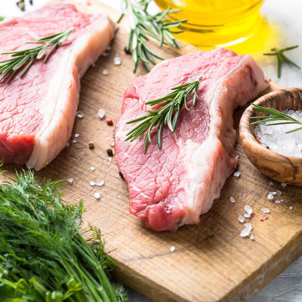 Raw beef striploin steak.